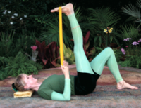 Yogini Kaliji in TriYoga Leg Stretch with tie